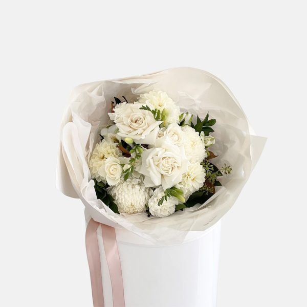 A posy of classic white flowers, dahlias, carnations, roses, disbuds, ivy berry. LULLY & ROSE Floral Studios Signature posies available for same day flower delivery Gold Coast