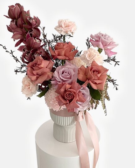 shop-florist-online-vintage-toned-fresh-flowers-vased-arrangement-of-rose-and-cymbidiums-on-the-gold-coast