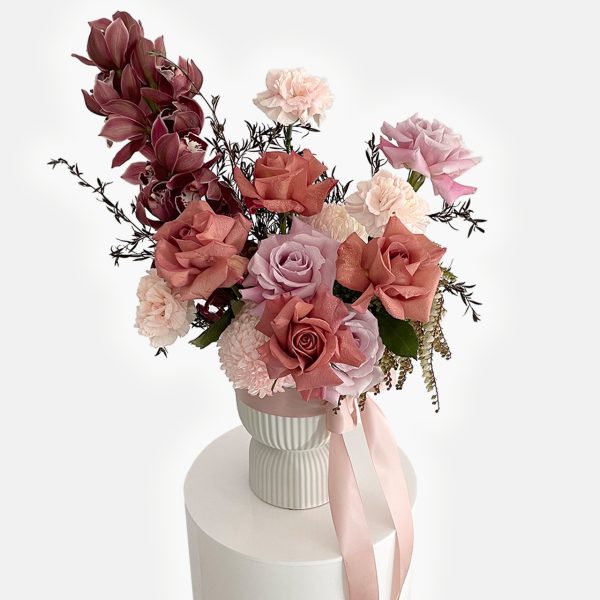 shop-florist-online-vintage-toned-fresh-flowers-vased-arrangement-of-rose-and-cymbidiums-on-the-gold-coast
