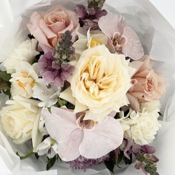 Carrara-flower-delivery-posy-of-flowers-in-lemon-peach-and-mauve-tones-featuring-roses-and-orchids-gold-coast