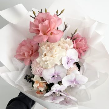 Helensvale-flower-delivery-service-bouquet-of-watermelon-toned-roses-white-roses-and-a-Phalaenopsis-orchid-Gold-Coast