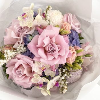 Posy of fresh roses mini orchids hydrangea andromeda and lisianthus flower for same day delivery on the Gold Coast