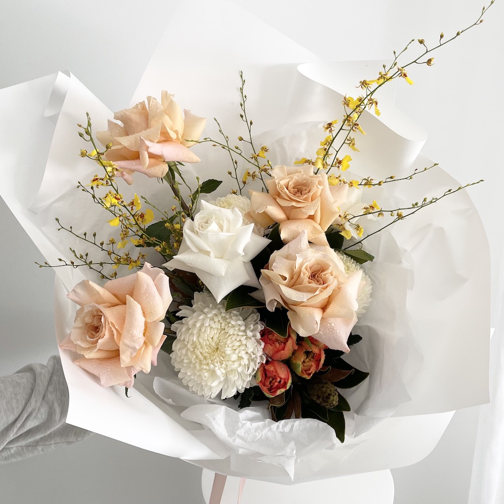 Labrador-florist-bouquet-of-peach-and-white-roses-tulips-and-dancing-lady-orchids-Gold-Coast