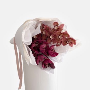 Shop en Masse minimalist design bouquet of cymbidium orchid stems in autumn tones for flower delivery Gold Coast